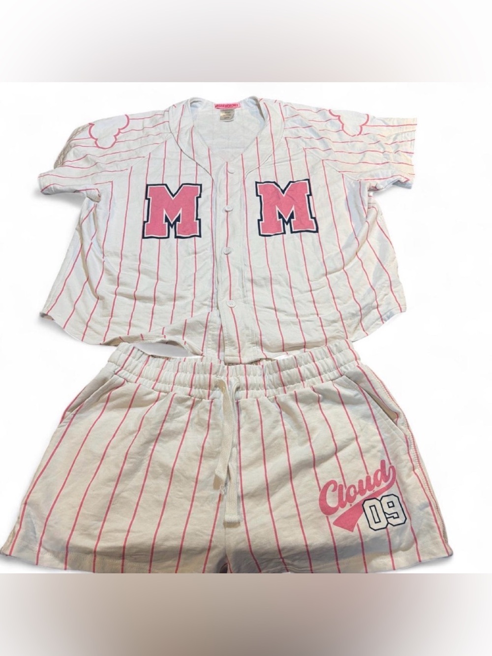 Megan Moroney  
Cloud 09 woman’s Pink-Striped Baseball Top & Shorts Set